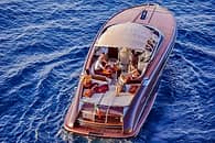 Sunset & champagne: tour in barca su motoscafo Riva 44 