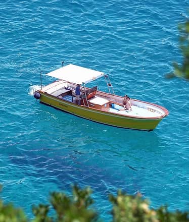Capri private boat tour with 10-meter gozzo boat