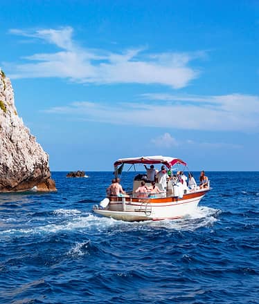 Tour in barca a Capri con pick up da Sorrento