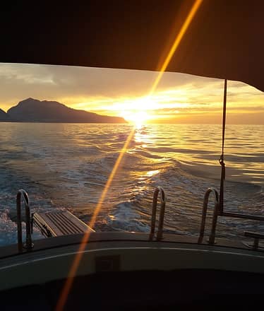 Tour privato in barca al tramonto a Capri