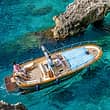 I'll Follow the Sun: giro in barca di Capri al tramonto