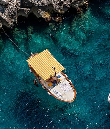 Capri Gozzo Boat Tour to the Faraglioni