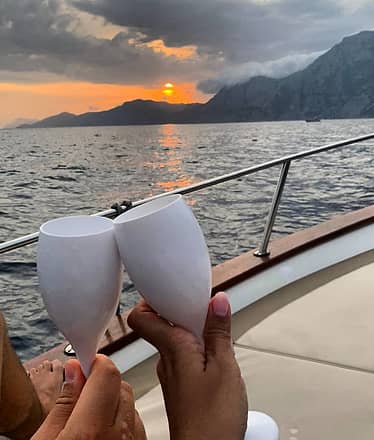 Tour di Capri in barca al tramonto con cocomero party!