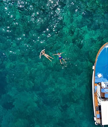 Professional photo shoot by boat on Capri